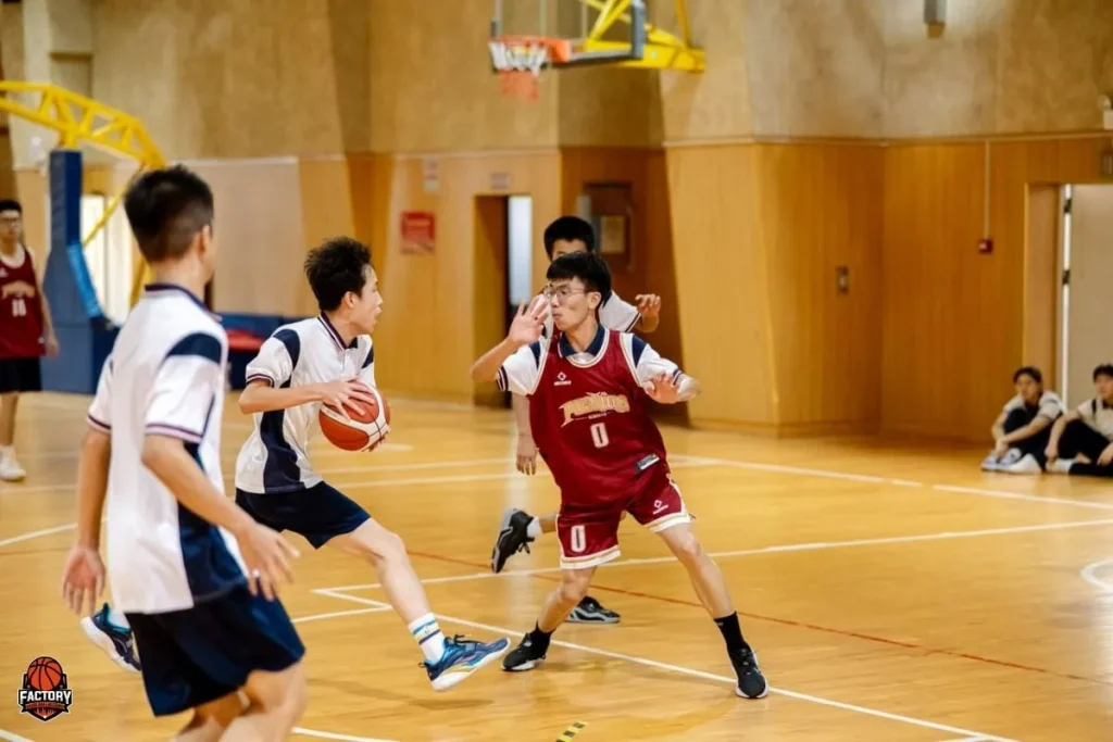 Athlete catching and shooting while a defender closes out