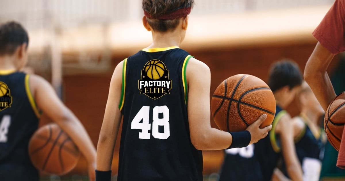 child practicing basketball